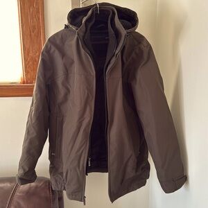 Weatherproof soft shell coat